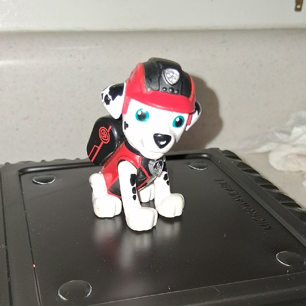 Red and Black Dalmatian Toy Figure